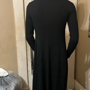 Woman’s button down cardigan. Can also be worn as a slim dress